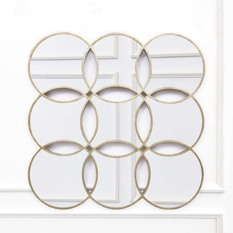 Round circular wall mirror and wall art decor. Hand-painted in antique champagne-gold finish.