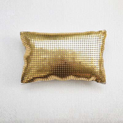 Dampierre Gold Boudoir Cushion is upholstered in matte gold mesh on one side. 