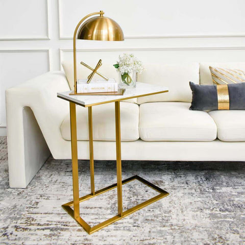 Voted as the designer’s choice, this One Draycott C-Shaped Marble End Table is the perfect solution for small condominiums or smaller rooms. With multi-purpose usage, this table slides under under the Chesterfield sofa for easy table accessibility.