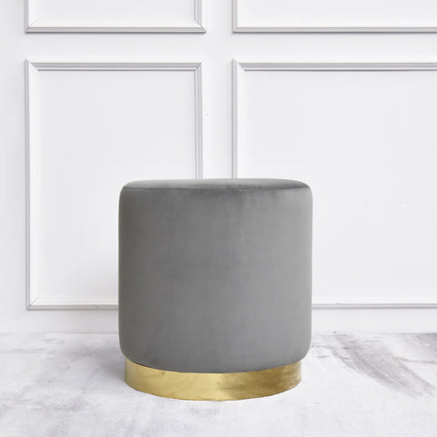 Lancelot Dresser Stool in a smooth grey velvet upholstery and Polished glossy gold finish at base foot.