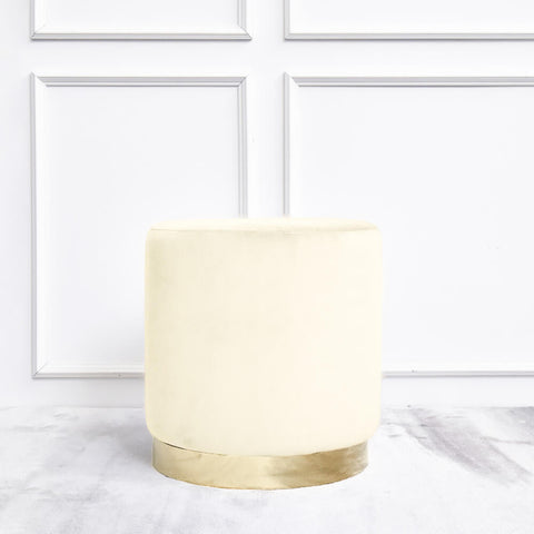 Lancelot Gold Stool makes a perfect addition for a modern home design. Ivory Cream Velvet lives off simplicity and gold stainless steel drum base elevates luxury.