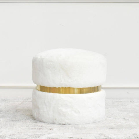 A classic timeless stool that magnifies innocence and beauty in white fur upholstery with a stainless steel gold belt.