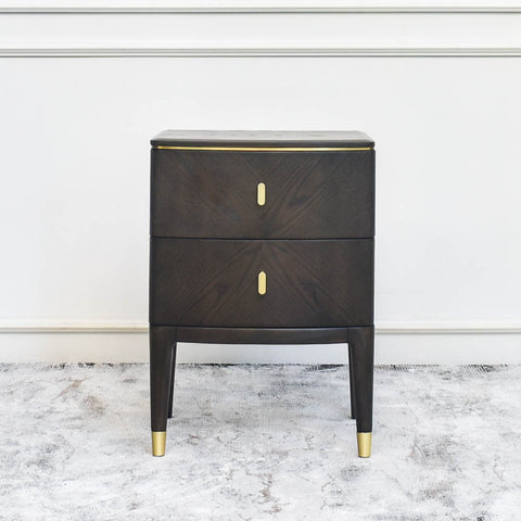 Odette Bedside Table, Large: A stylish bedside table showcasing its timeless wood surfaces and sleek, straight-lined cabinets, perfect for any home design.