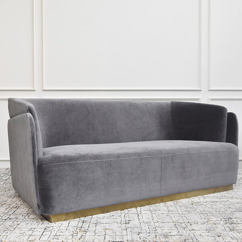 Modern mid-century Velvet Sofa, smooth lush velvet upholstery with gold base plinth. 